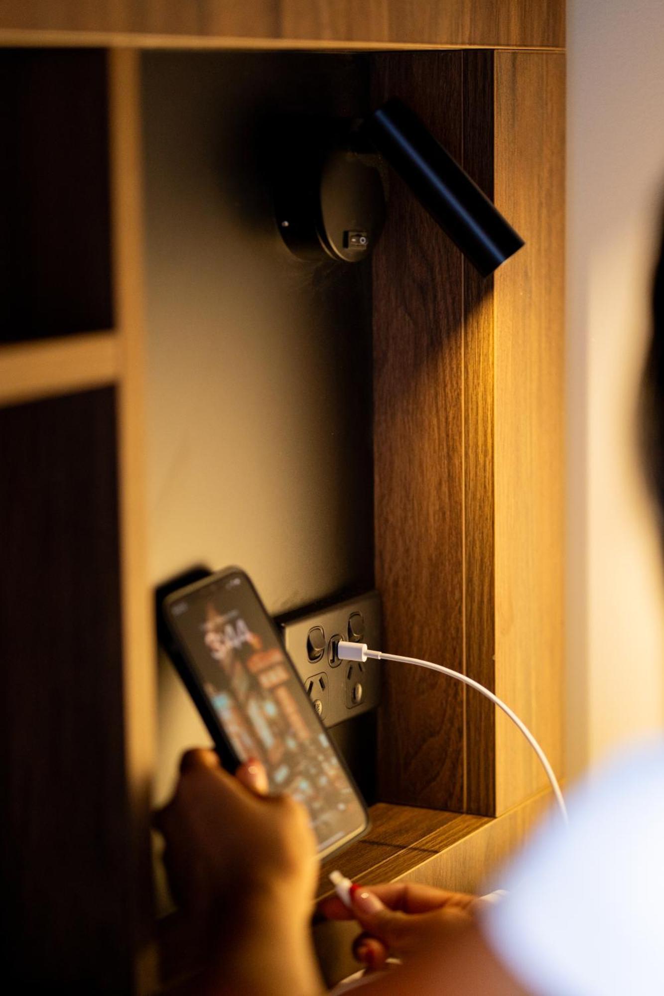 Haka House Christchurch Eksteriør bilde A phone plugged into a power socket